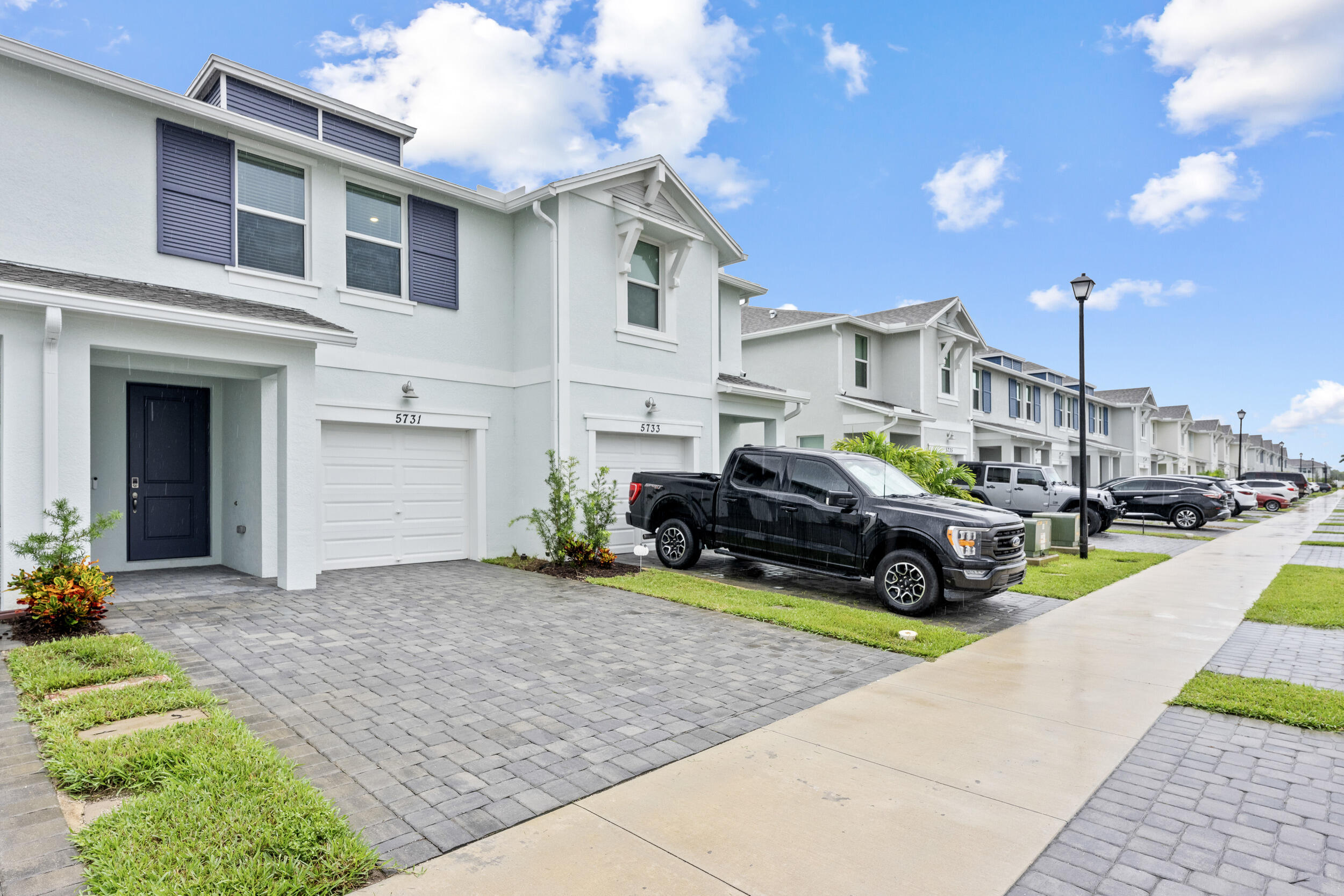 5731 Southeast Edgewater Circle Stuart, FL 34997 - Photo 36 of 42 a view of a house with backyard and sitting area