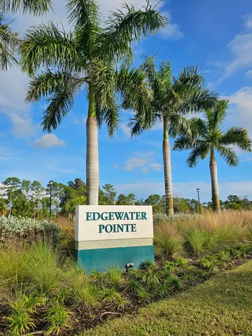 a sign board with ocean view