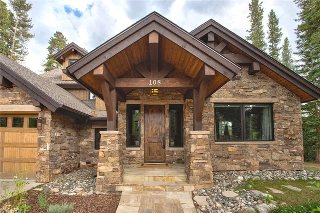 a view of a house with entrance gate