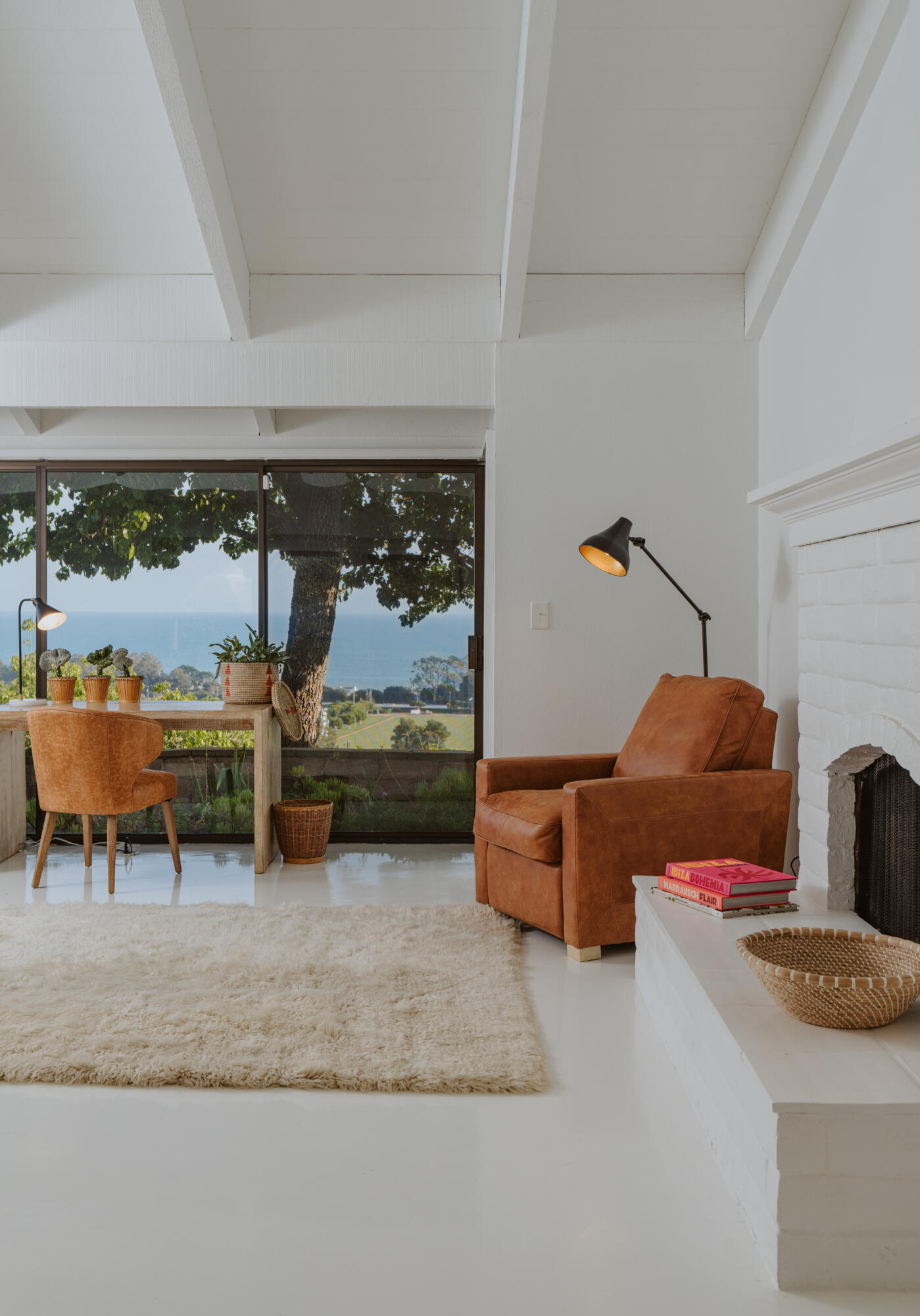 3330 Foothill Road Carpinteria, CA 93013 - Photo 23 of 56 a living room with furniture and a floor to ceiling window