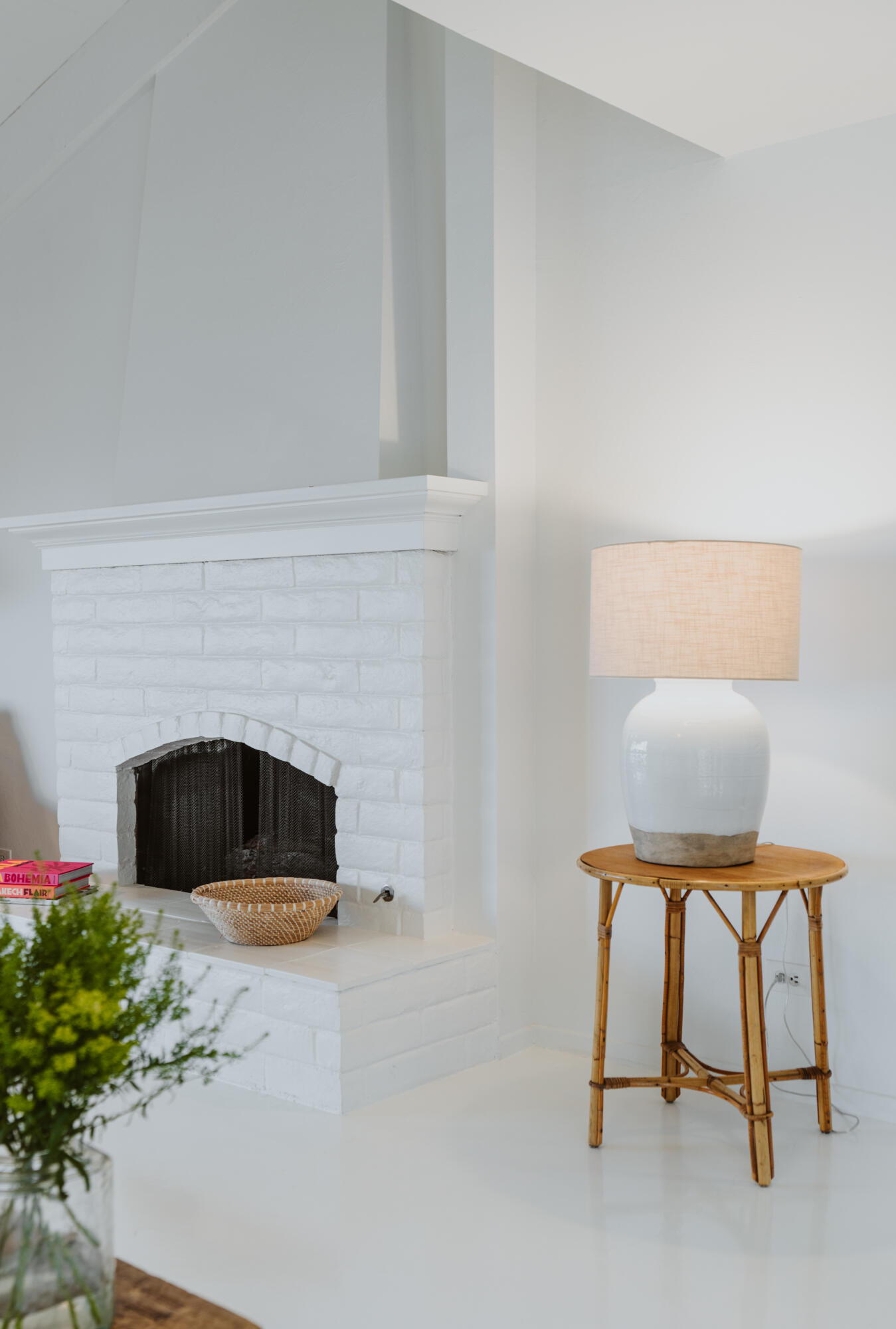 3330 Foothill Road Carpinteria, CA 93013 - Photo 29 of 56 a living room with a fireplace and a potted plant