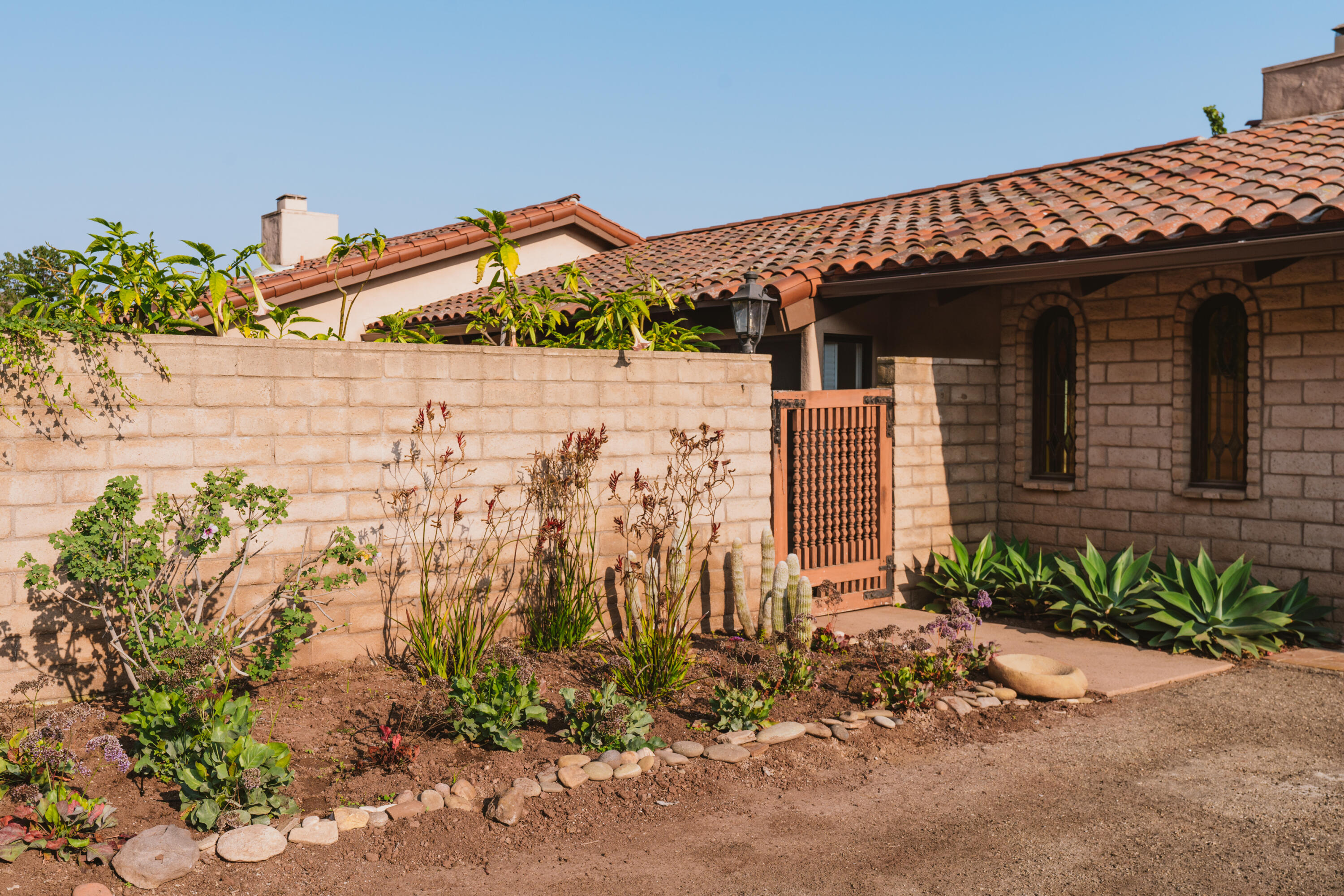 3330 Foothill Road Carpinteria, CA 93013 - Photo 50 of 56 a front view of a house with a yard