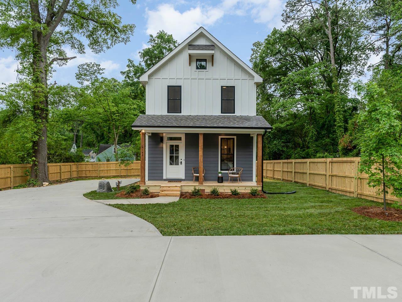 614 East Ellerbee Street Durham, NC 27704 - Photo 1 of 28 a front view of a house with a yard