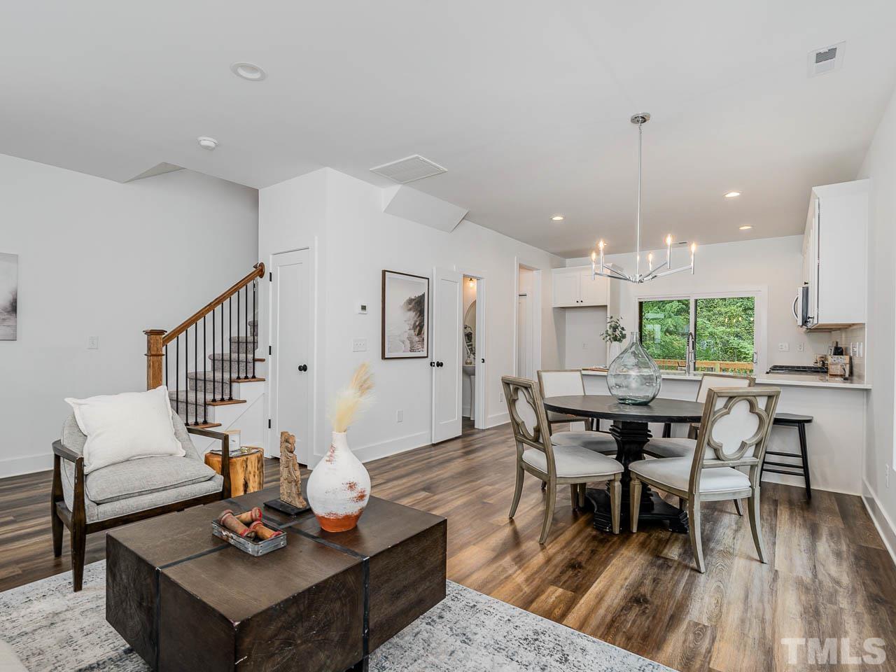 614 East Ellerbee Street Durham, NC 27704 - Photo 12 of 28 a living room with furniture and wooden floor