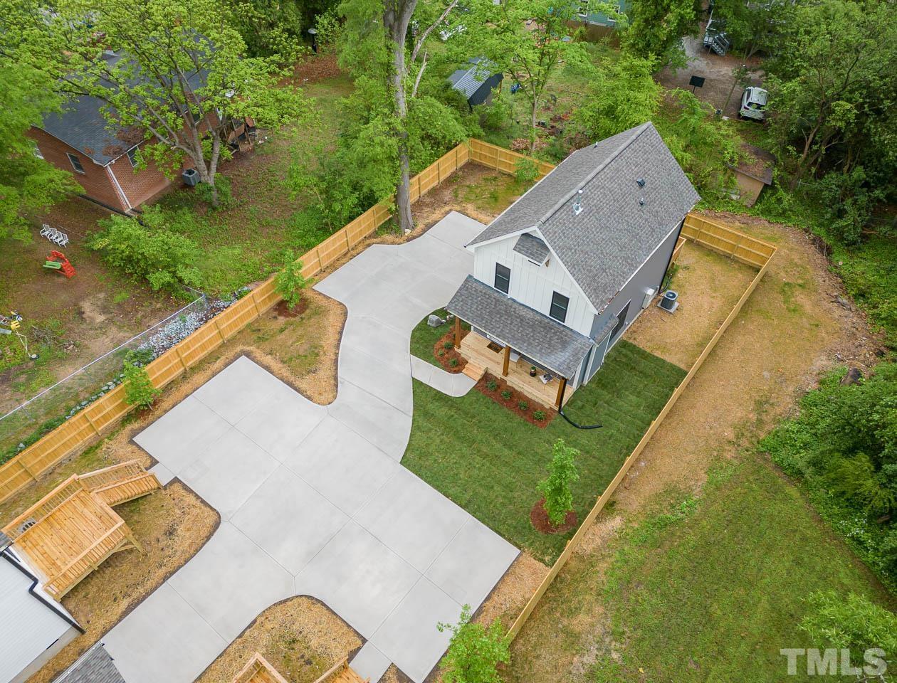 614 East Ellerbee Street Durham, NC 27704 - Photo 7 of 28 an aerial view of a house with garden space and street view