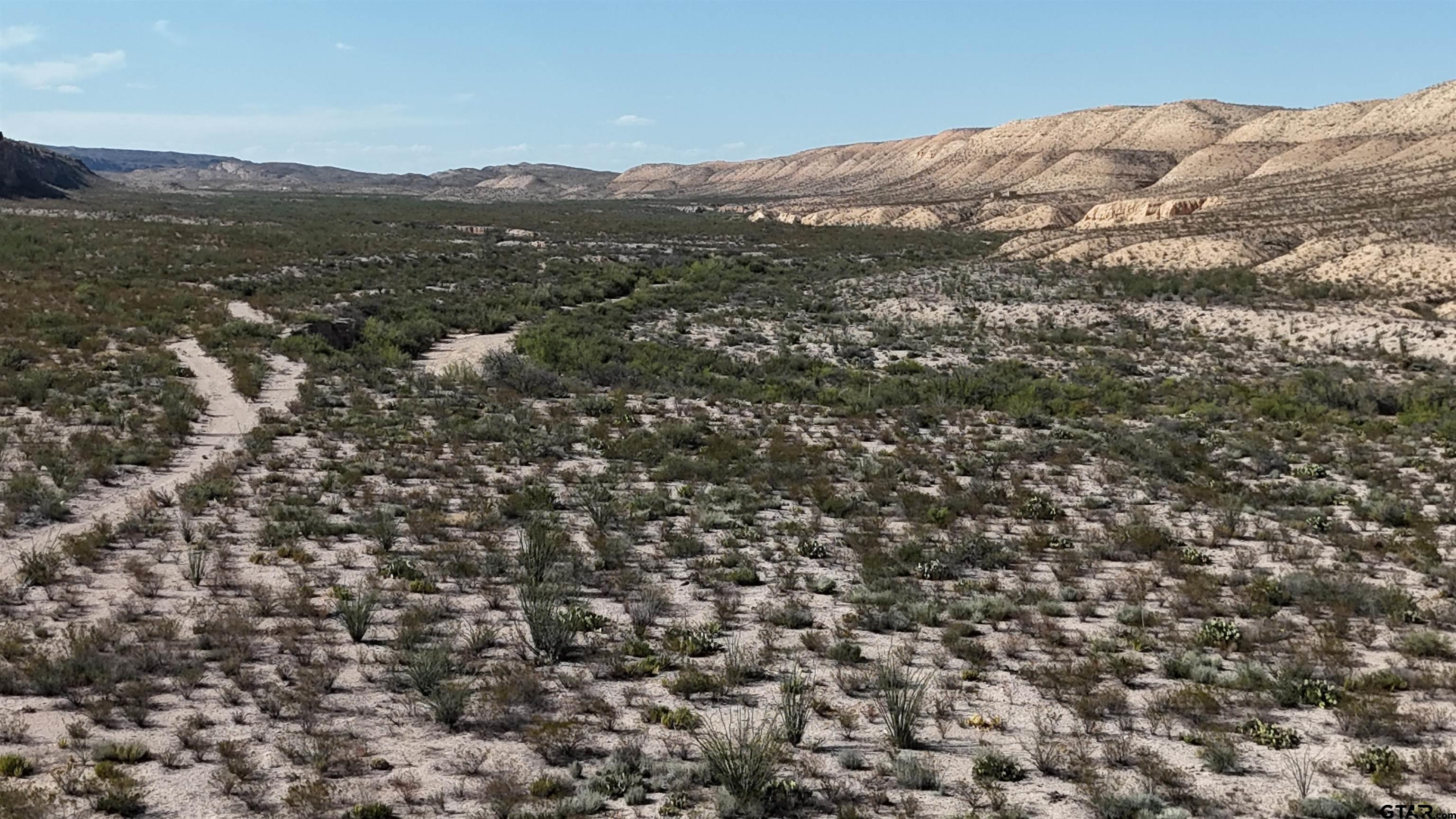 26885 Long Draw Terlingua, TX 79852 - Photo 24 of 28 a view of a city with mountains in the background
