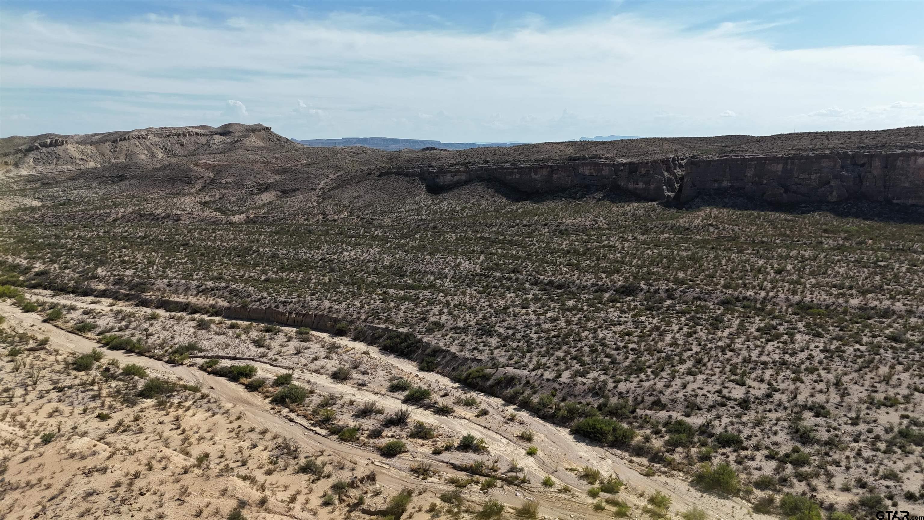 26885 Long Draw Terlingua, TX 79852 - Photo 3 of 28 a view of a dry yard