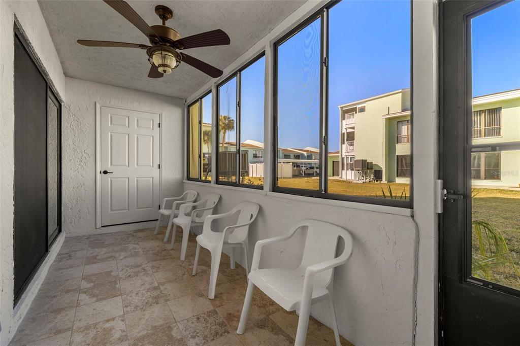 1 Windrush Boulevard, Unit 19 Indian Rocks Beach, FL 33785 - Photo 31 of 52 a dining room with furniture and window