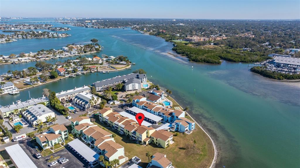 1 Windrush Boulevard, Unit 19 Indian Rocks Beach, FL 33785 - Photo 48 of 52 an aerial view of a house with a lake view