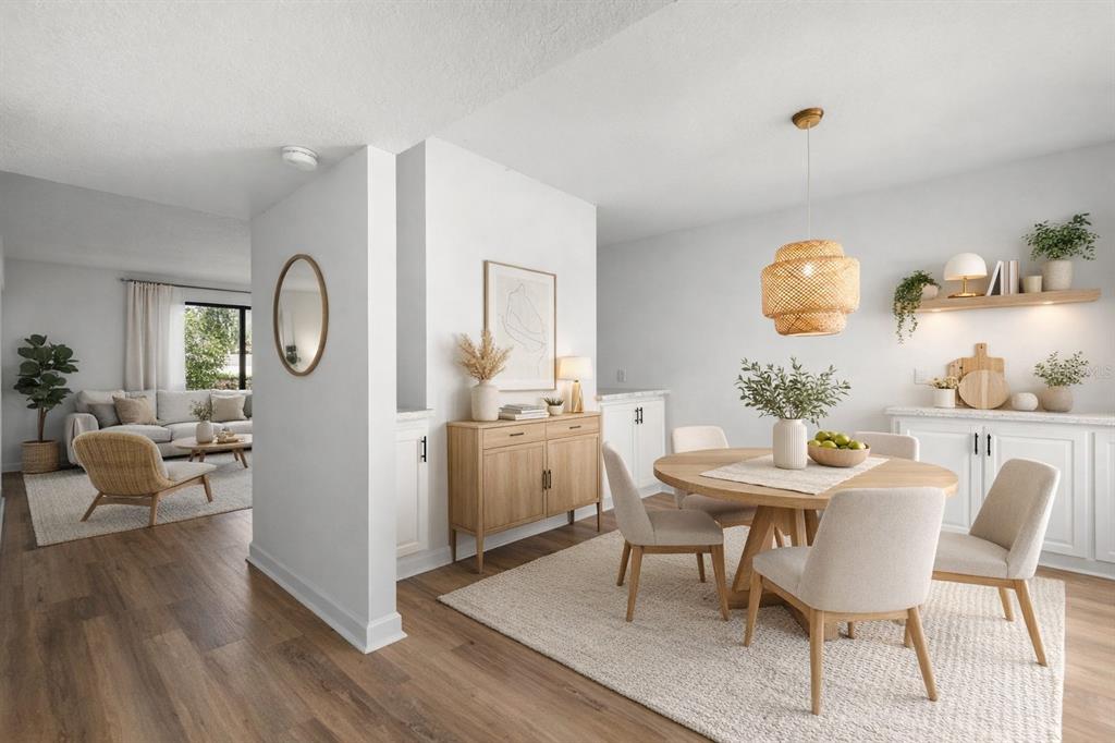 1 Windrush Boulevard, Unit 19 Indian Rocks Beach, FL 33785 - Photo 6 of 52 a view of a dining room with furniture and wooden floor