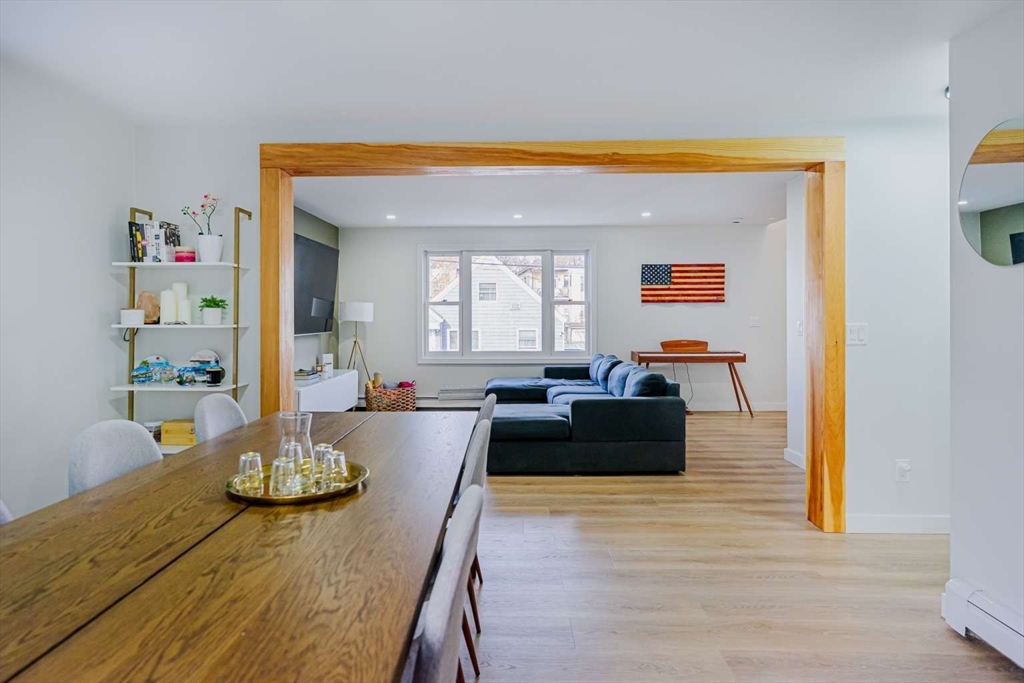 27 Silver Road, Unit 27 Everett, MA 02149 - Photo 15 of 42 a living room with furniture and a wooden floor