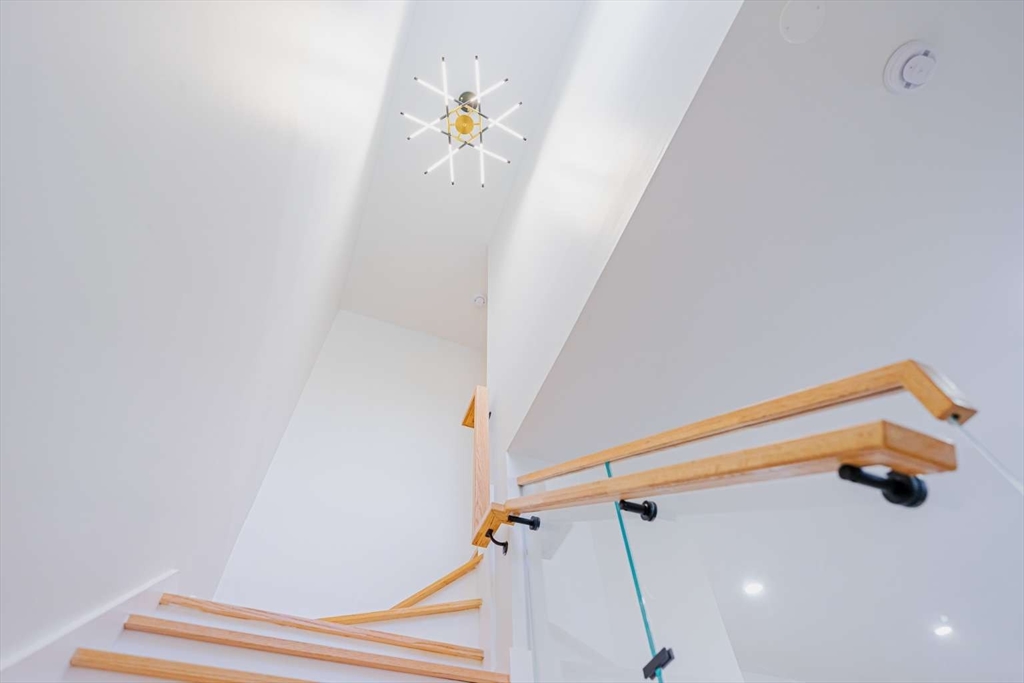 27 Silver Road, Unit 27 Everett, MA 02149 - Photo 20 of 42 a view of staircase with white walls