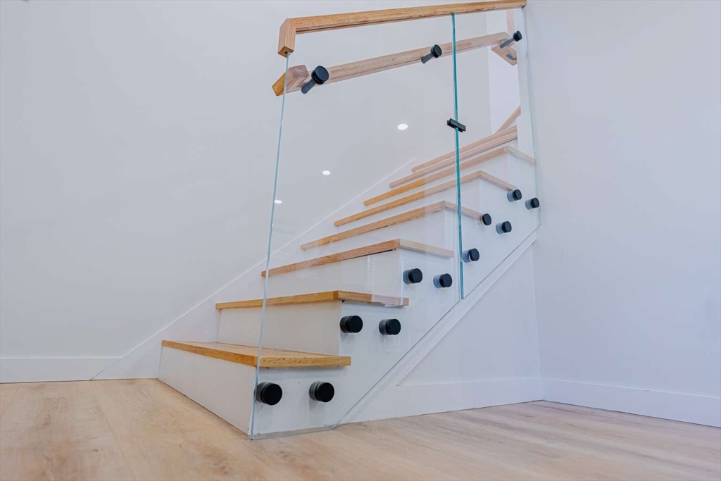 27 Silver Road, Unit 27 Everett, MA 02149 - Photo 21 of 42 a white cabinet with white walls