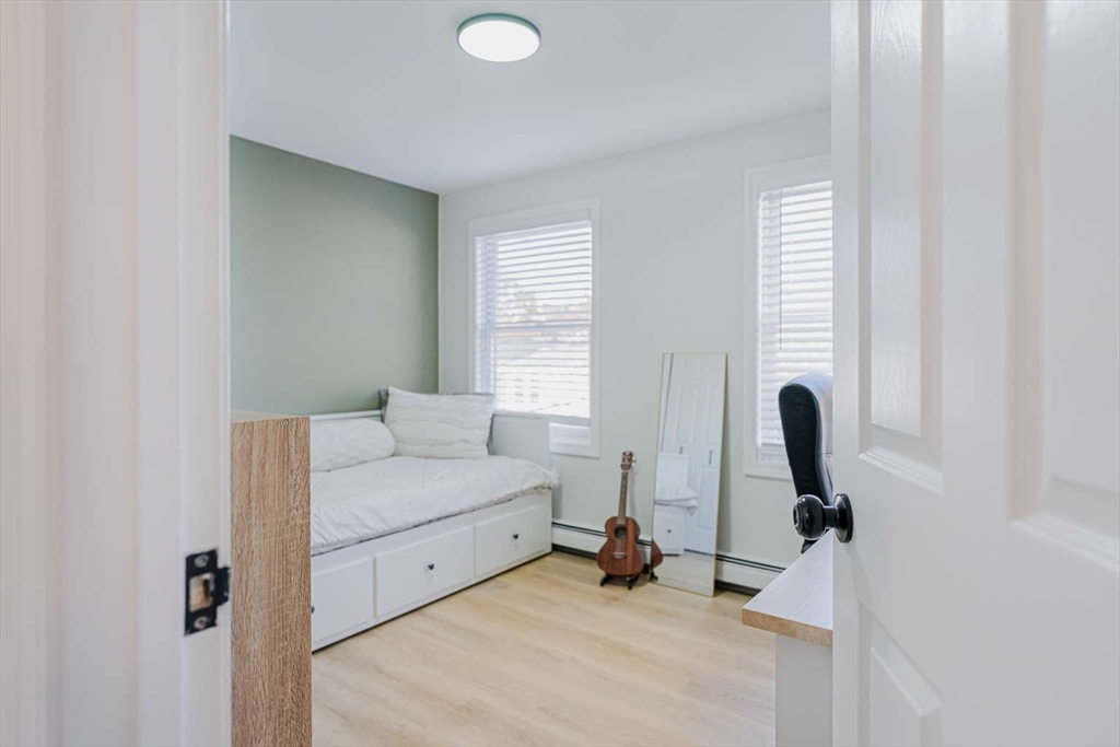 27 Silver Road, Unit 27 Everett, MA 02149 - Photo 33 of 42 a living room with furniture and a window
