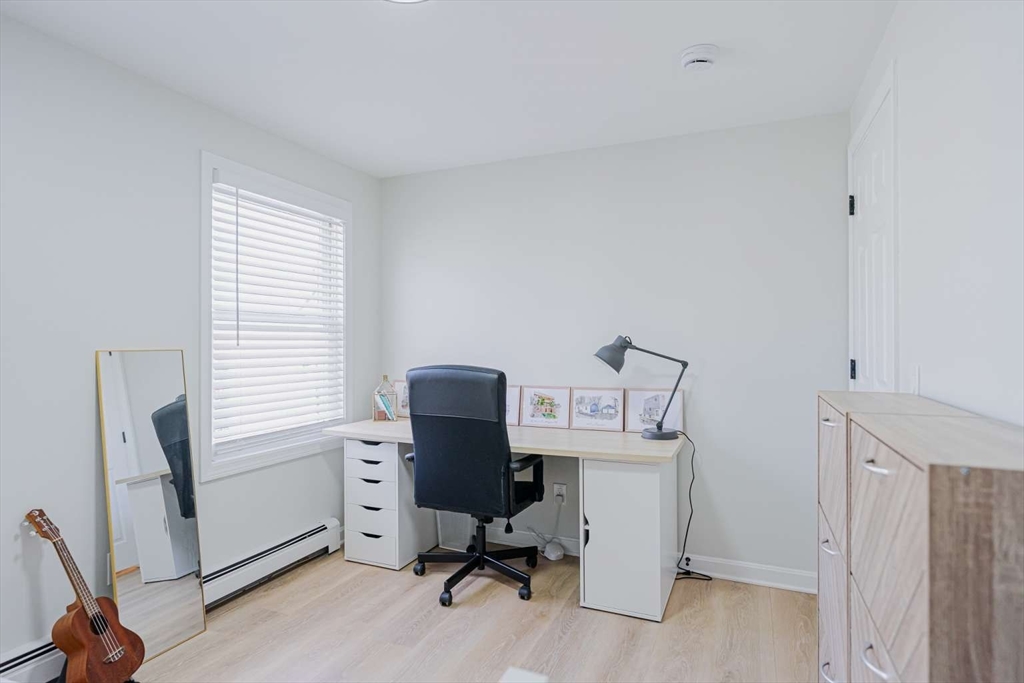 27 Silver Road, Unit 27 Everett, MA 02149 - Photo 34 of 42 a view of a workspace with furniture and a window