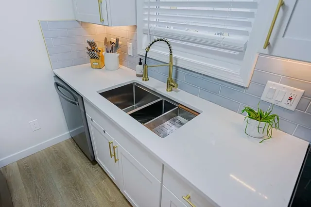 a close view of dining table with kitchen appliances