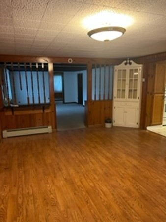 23 Edgewood Road Billerica, MA 01821 - Photo 23 of 40 a view of an empty room with wooden floor and windows