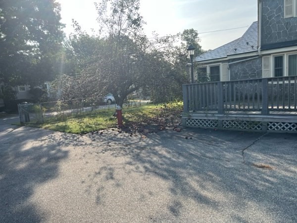 23 Edgewood Road Billerica, MA 01821 - Photo 7 of 40 a backyard of a house with lots of green space