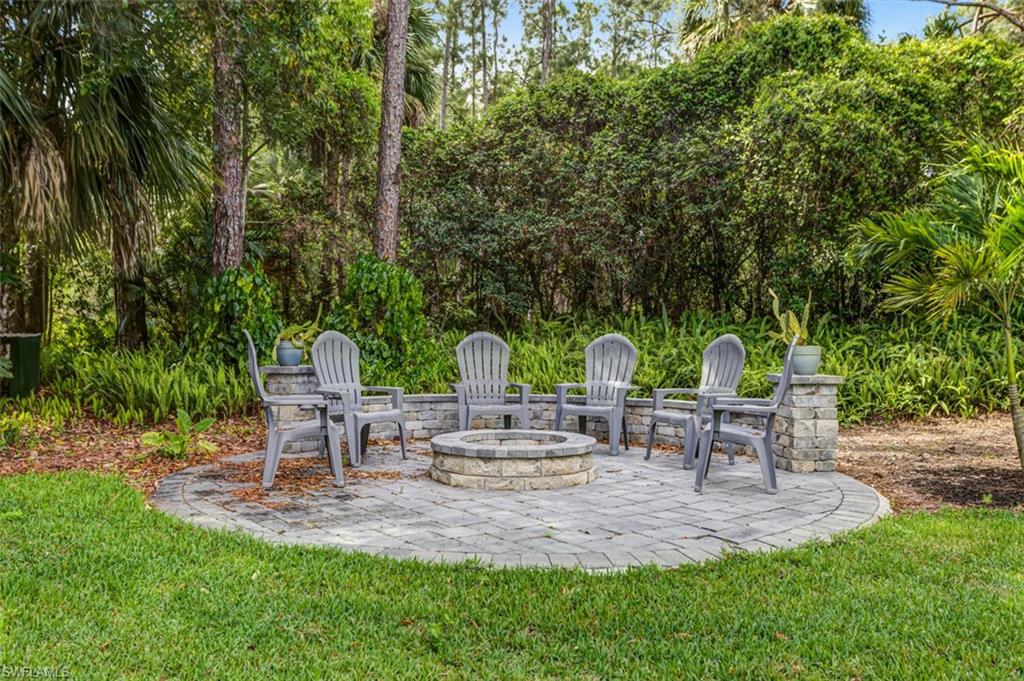 4710 15th Avenue Southwest Naples, FL 34116 - Photo 11 of 49 a view of a park with bench and sitting area