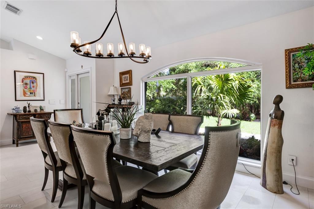 4710 15th Avenue Southwest Naples, FL 34116 - Photo 18 of 49 a view of a dining room with furniture window and outside view