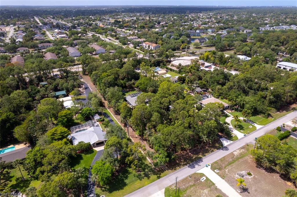 4710 15th Avenue Southwest Naples, FL 34116 - Photo 45 of 49 an aerial view of residential houses with city view