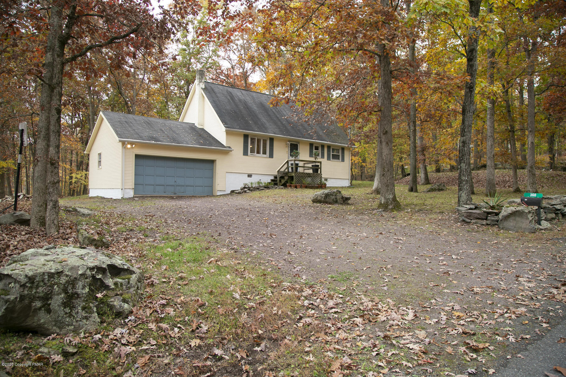 360 Timber Hill Road Henryville, PA 18332 - Photo 4 of 37 a view of a house with a yard tree and sitting area