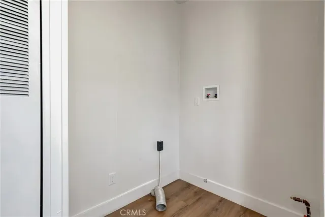 a view of small space with wooden floor