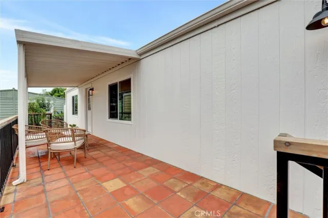 a view of a pathway with a plants
