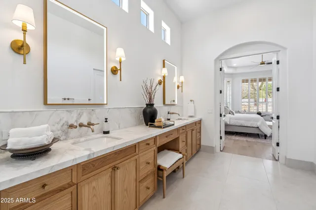 a view of a chairs and table in patio of the house