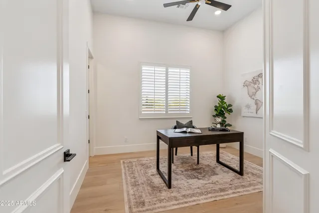a view of yard with swimming pool and seating area