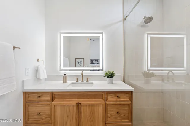 a view of a house with backyard porch and sitting area