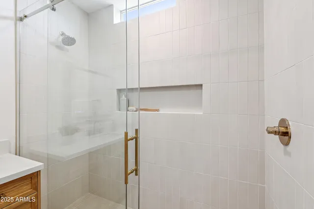 a view of a house with swimming pool and sitting area