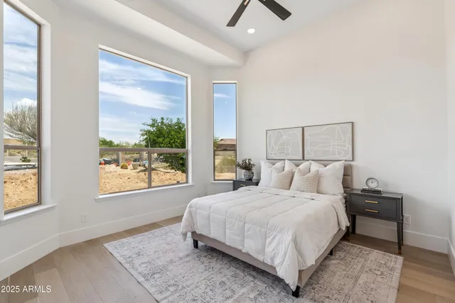 a view of a swimming pool with a lounge chairs