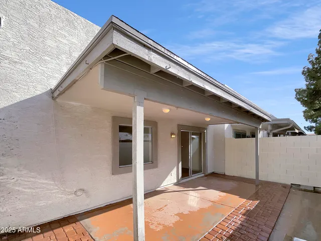 a spacious bathroom with a sink and a mirror