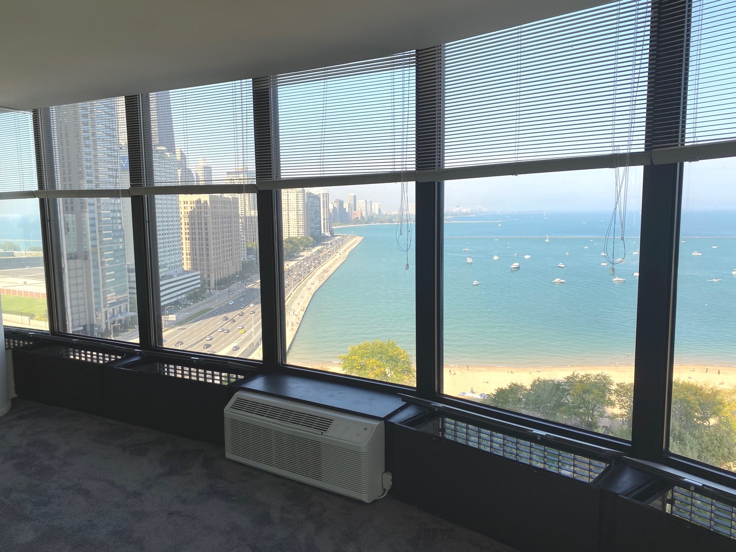 505 North Lake Shore Drive, Unit 1804 Chicago, IL 60611 - Photo 2 of 24 a view of an empty room with a large window