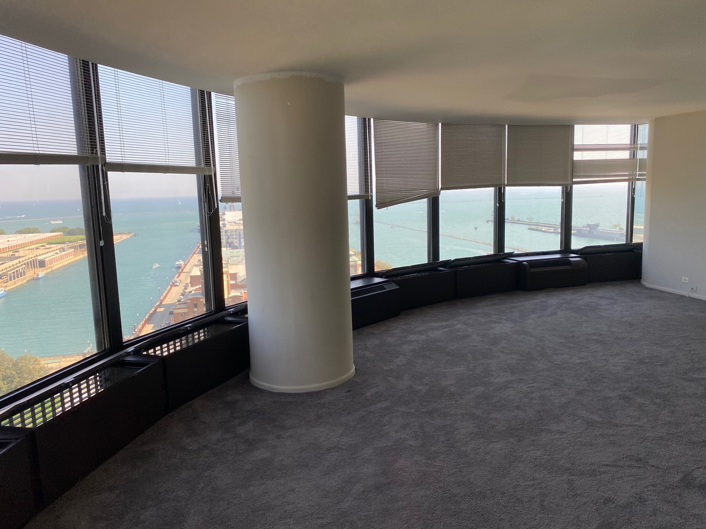 505 North Lake Shore Drive, Unit 1804 Chicago, IL 60611 - Photo 5 of 24 an empty room with windows