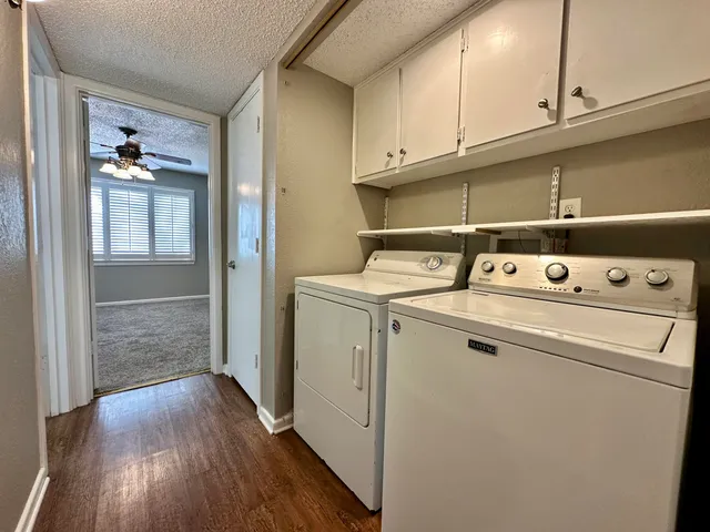 a utility room with dryer and washer