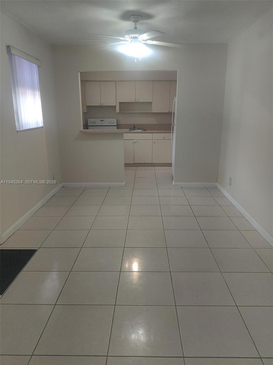 844 Southwest 10th Street Hallandale Beach, FL 33009 - Photo 11 of 18 a view of kitchen and window