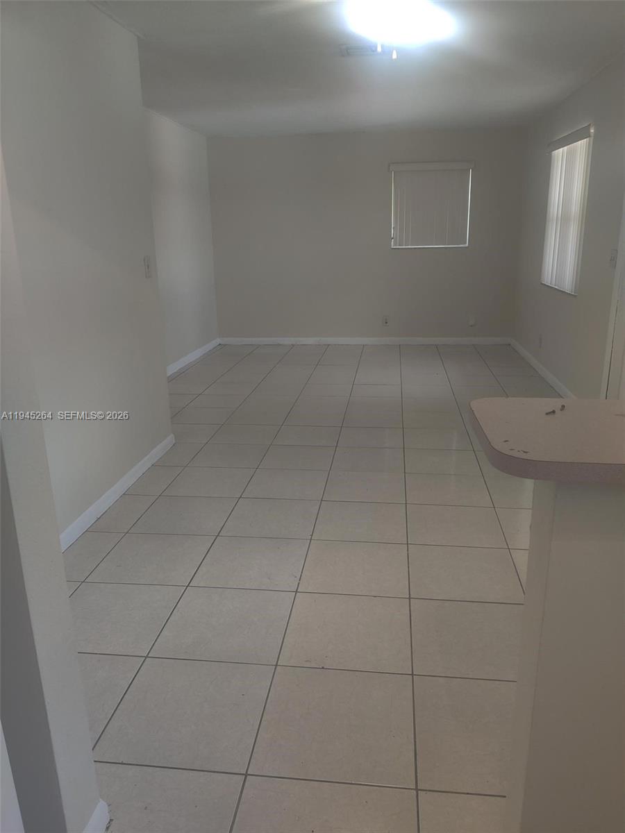 844 Southwest 10th Street Hallandale Beach, FL 33009 - Photo 13 of 18 wooden floor in a bathroom