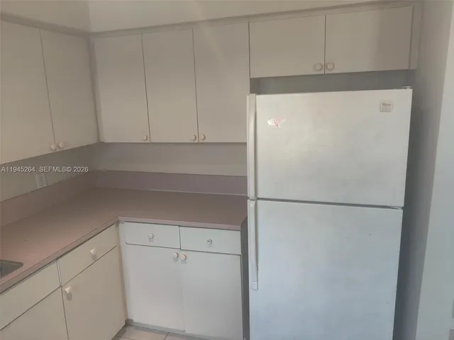 a bathroom with a toilet a sink and bathtub