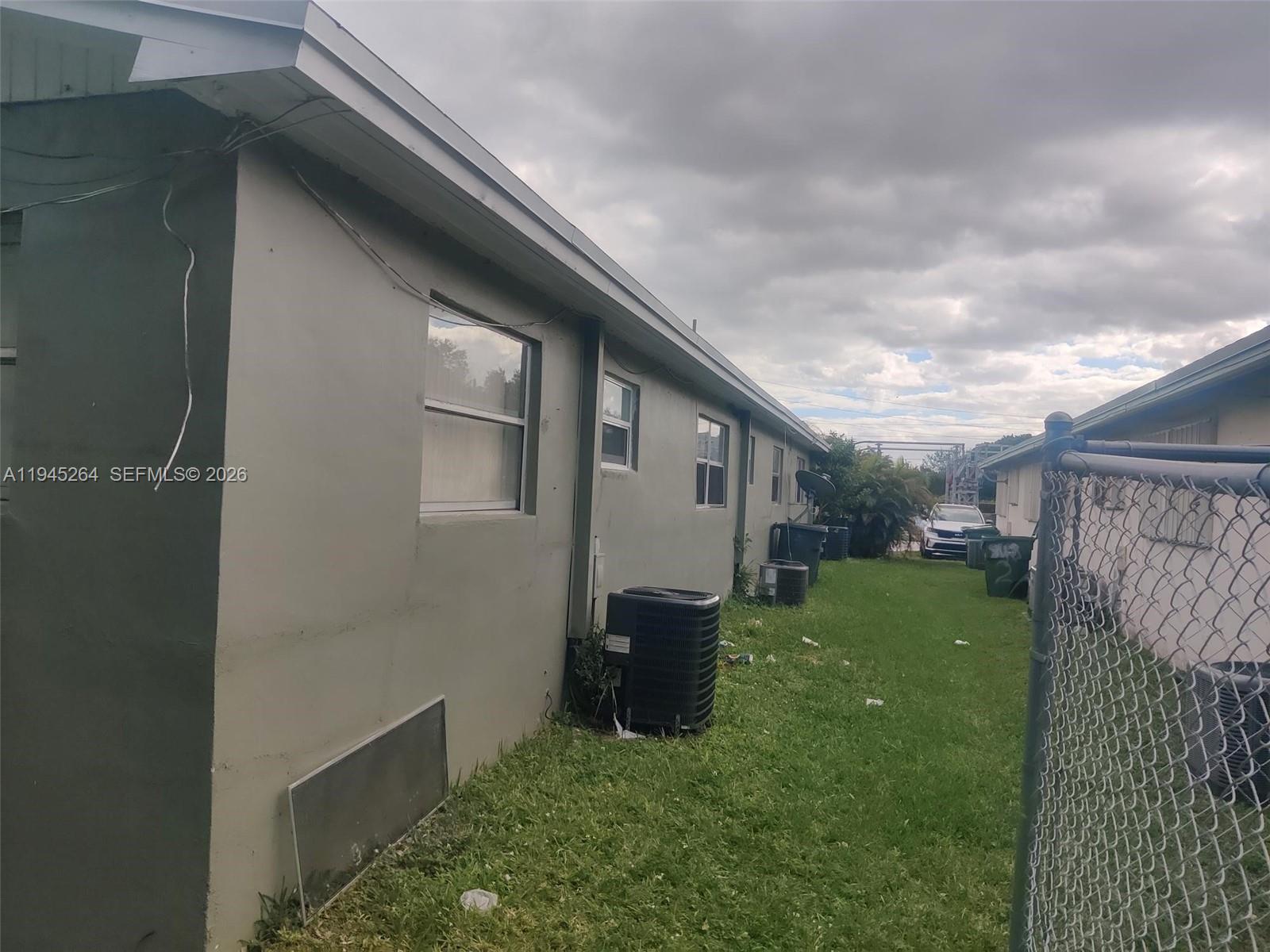 844 Southwest 10th Street Hallandale Beach, FL 33009 - Photo 6 of 18 a view of a back yard of the house
