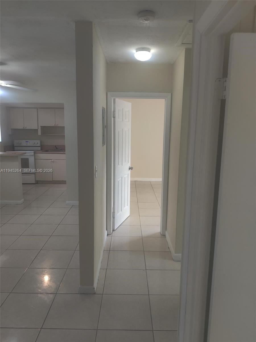 844 Southwest 10th Street Hallandale Beach, FL 33009 - Photo 10 of 18 a view of an empty room with a bathroom