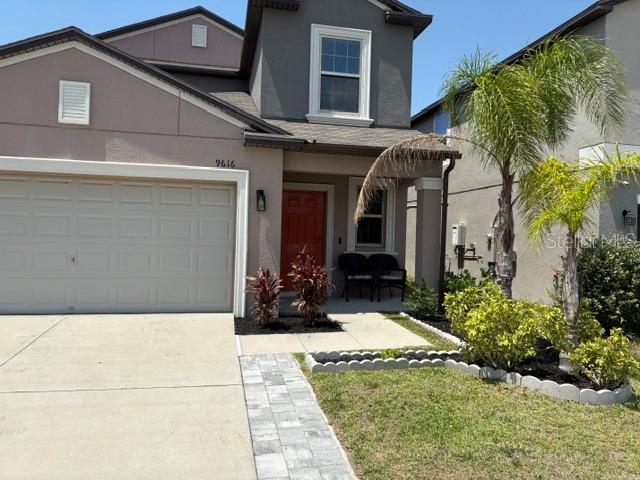 9616 Lemon Drop Loop Sun City Center, FL 33573 - Photo 5 of 53 a view of house and front door