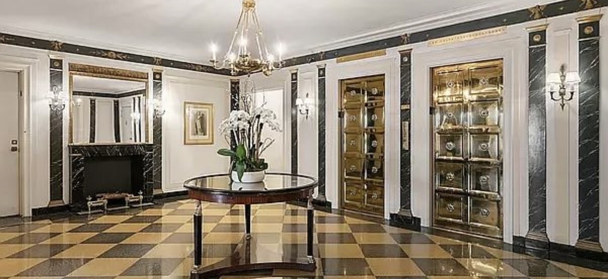 336 West End Avenue, Unit 3D Manhattan, NY 10023 - Photo 12 of 18 a view of a hallway with a dining table and chandelier