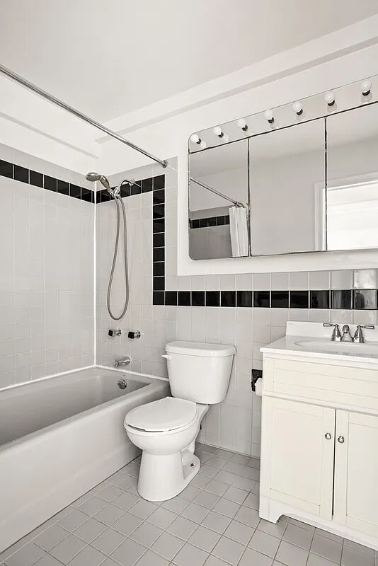 336 West End Avenue, Unit 3D Manhattan, NY 10023 - Photo 7 of 18 a bathroom with a sink a toilet and shower