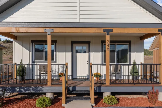 a view of a balcony with chairs