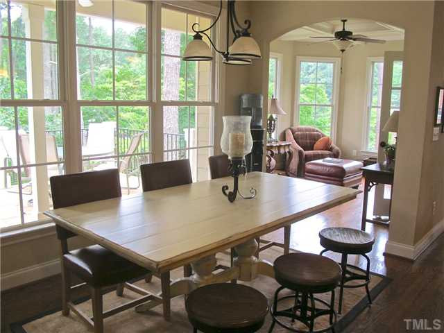 907 Shelley Road Raleigh, NC 27609 - Photo 9 of 23 a view of a dining room with furniture and window