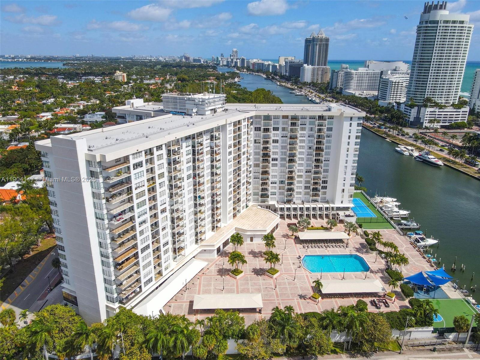 4101 Pine Tree Drive, Unit 707 Miami Beach, FL 33140 - Photo 2 of 41 a view of a city with tall buildings