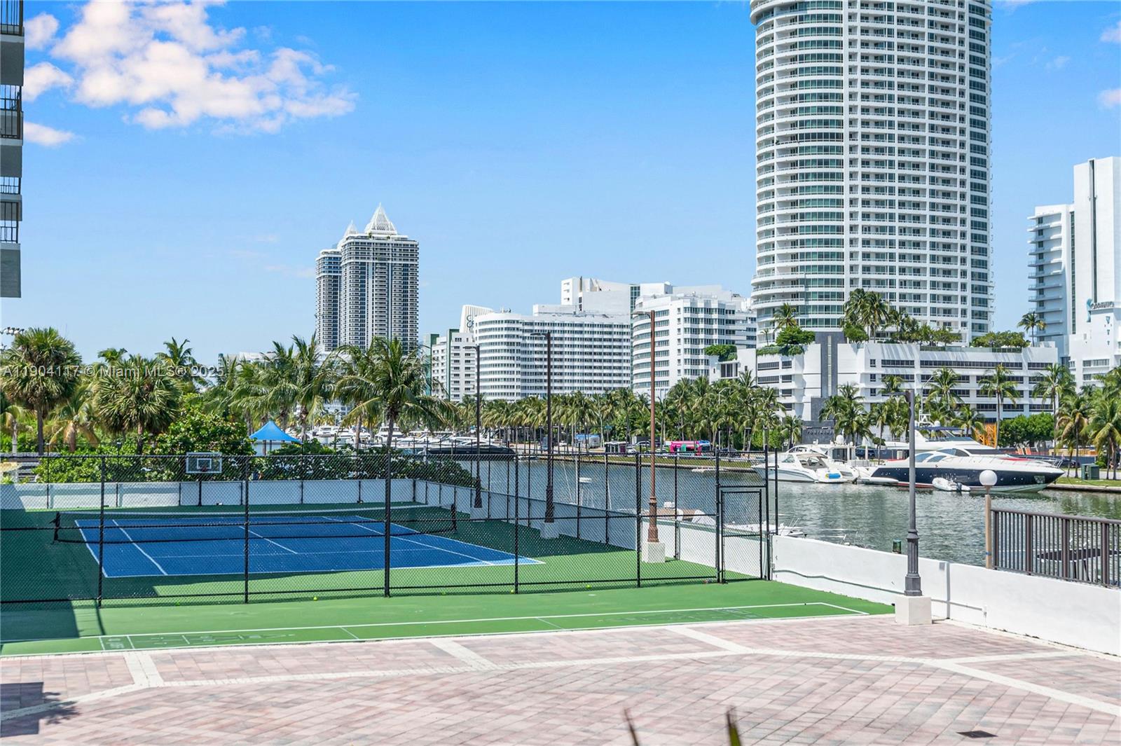 4101 Pine Tree Drive, Unit 707 Miami Beach, FL 33140 - Photo 35 of 41 a view of a city with tall buildings