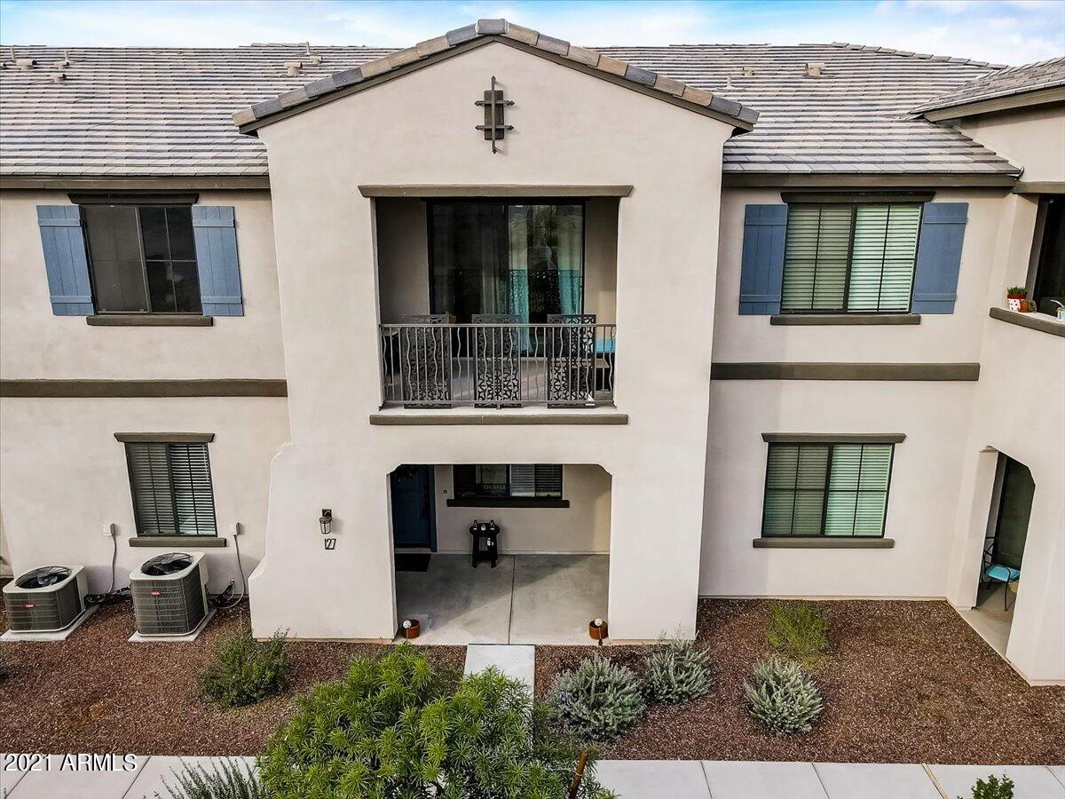 3900 East Baseline Road, Unit 127 Phoenix, AZ 85042 - Photo 49 of 60 a front view of a house with outdoor seating